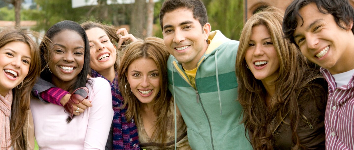happy group of young people at a university college